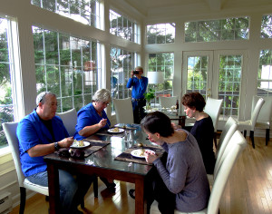tasting-the-halibut-ganty-in-the-solarium-w-photog-rick by Sue Henderson, Henderson Productions
