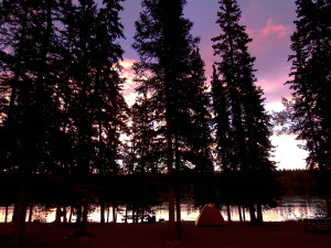Camping with a tranquil sunset along the Yukon River