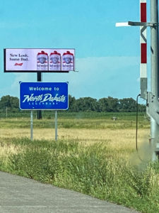 North Dakota highway landscape and signs